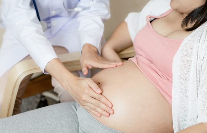 happy-pregnant-woman-visit-gynecologist-doctor-at-hospital-or-clinic-for-pregnancy-consultant-(1)